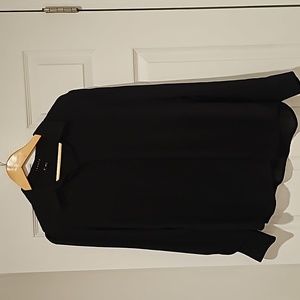 Theory pure silk semi sheer blouse with hidden buttons.